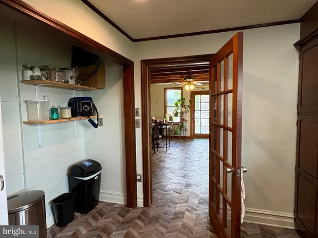 a hallway with a stove