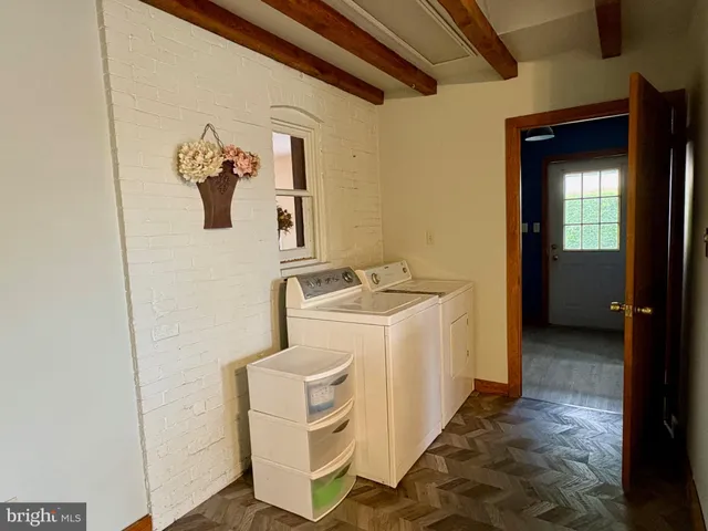a bathroom with a sink and mirror