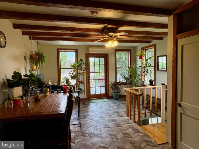 a view of a livingroom with furniture window