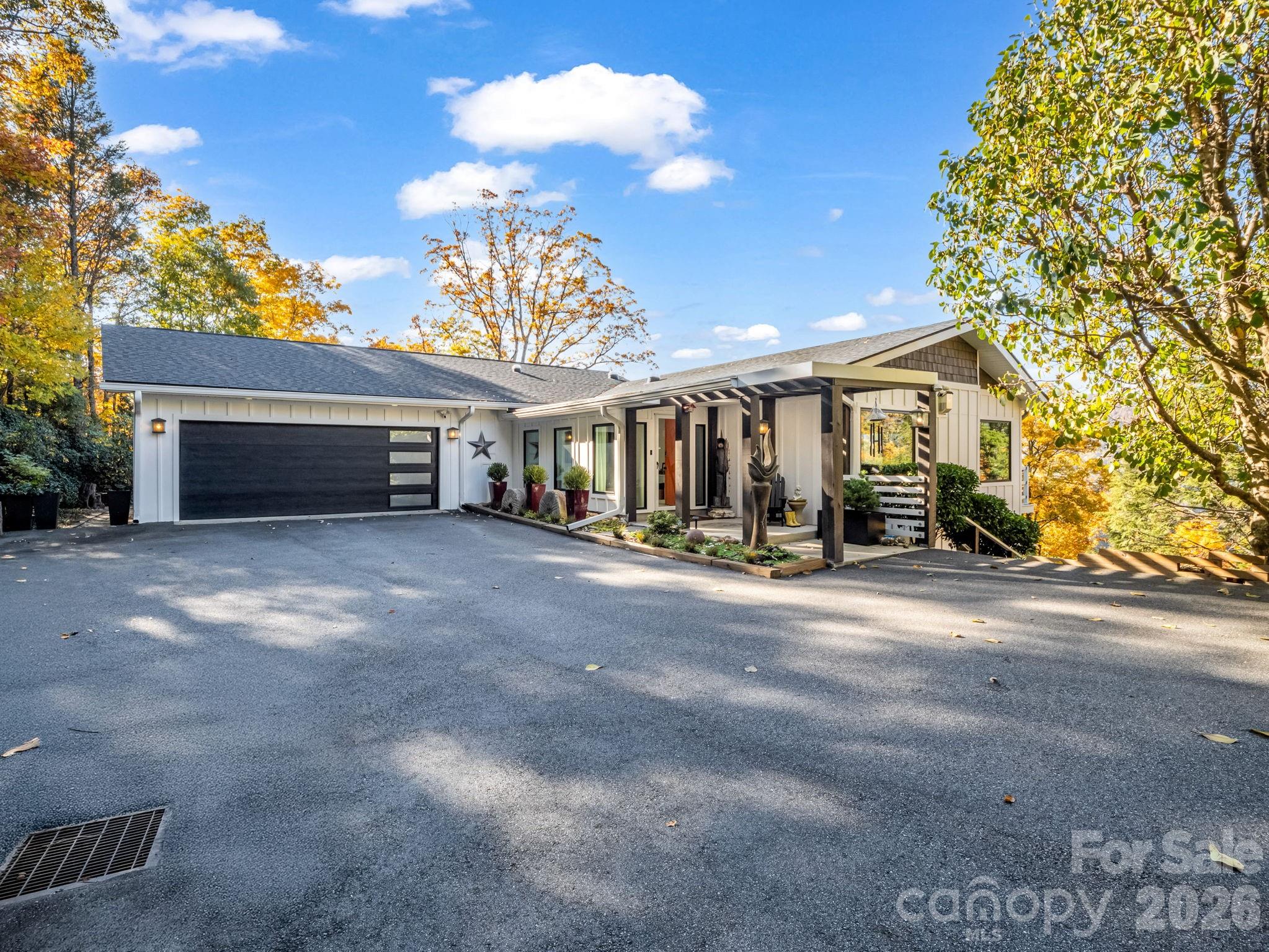 a view of a house with basketball court