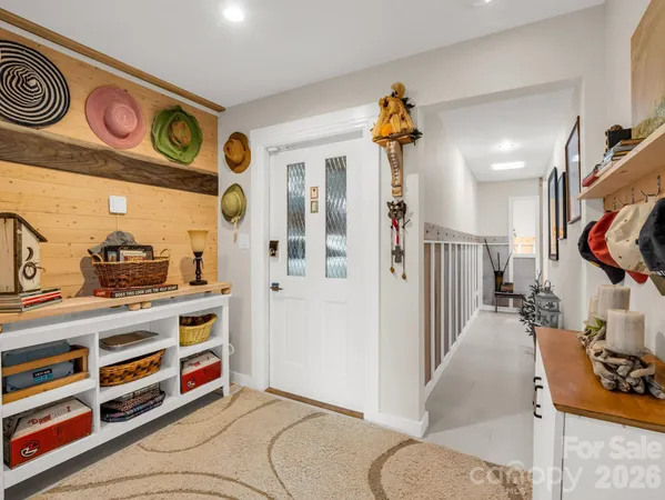a view of a livingroom with furniture and toys