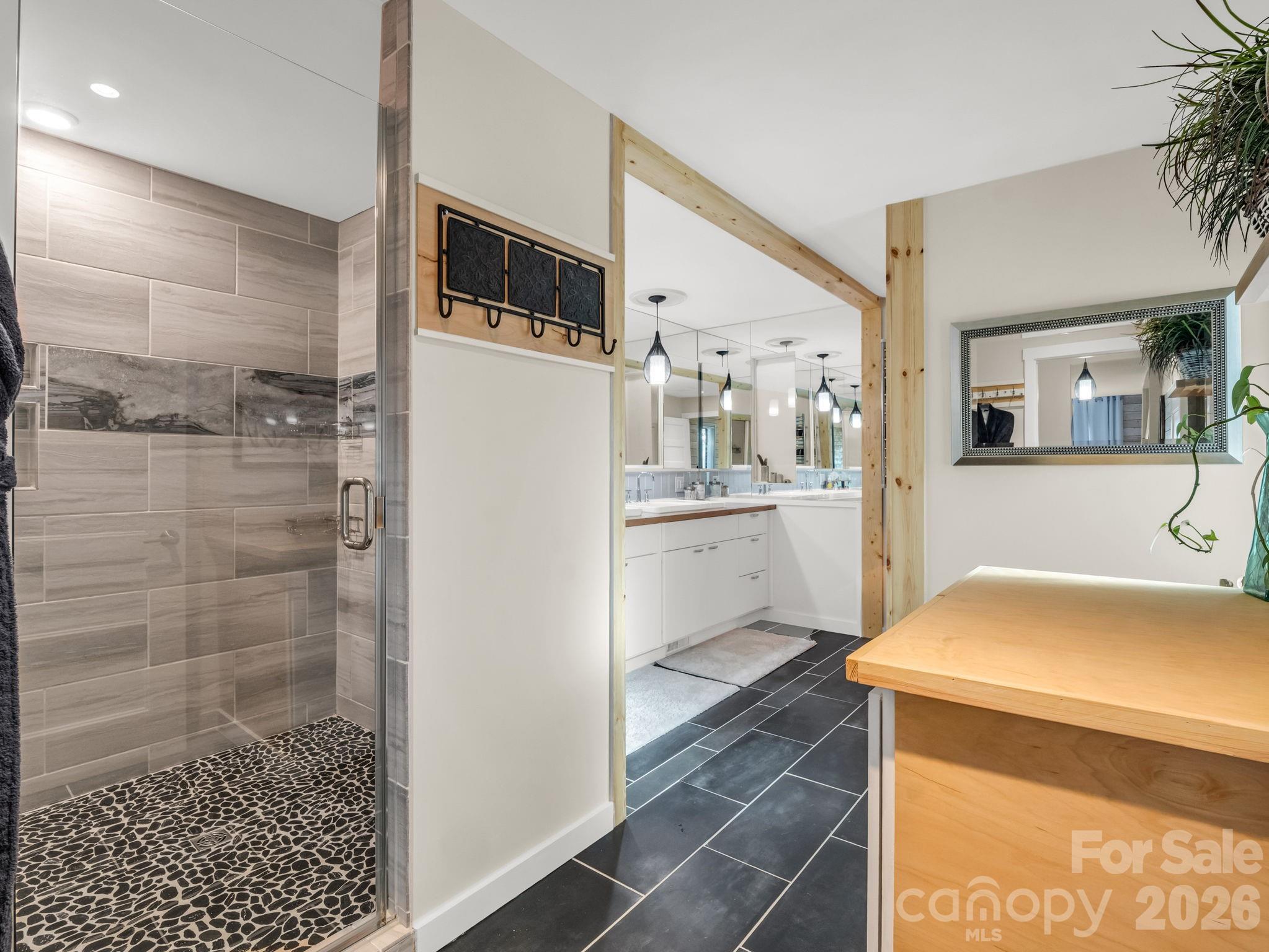 200 Piney Mountain Road Tryon, NC 28782 - Photo 27 of 48 a kitchen with a refrigerator and a sink