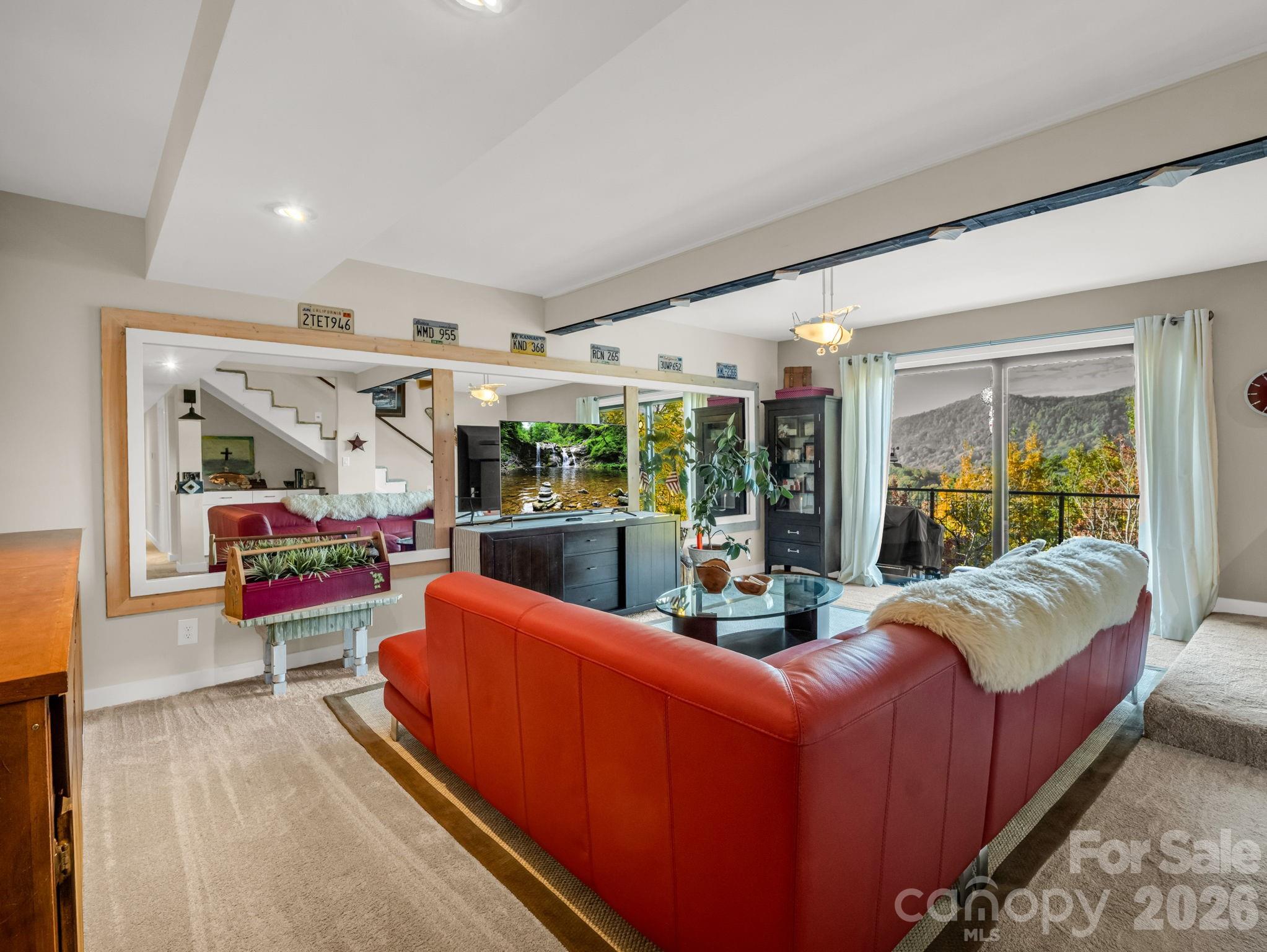 200 Piney Mountain Road Tryon, NC 28782 - Photo 28 of 48 a living room with furniture and a large window