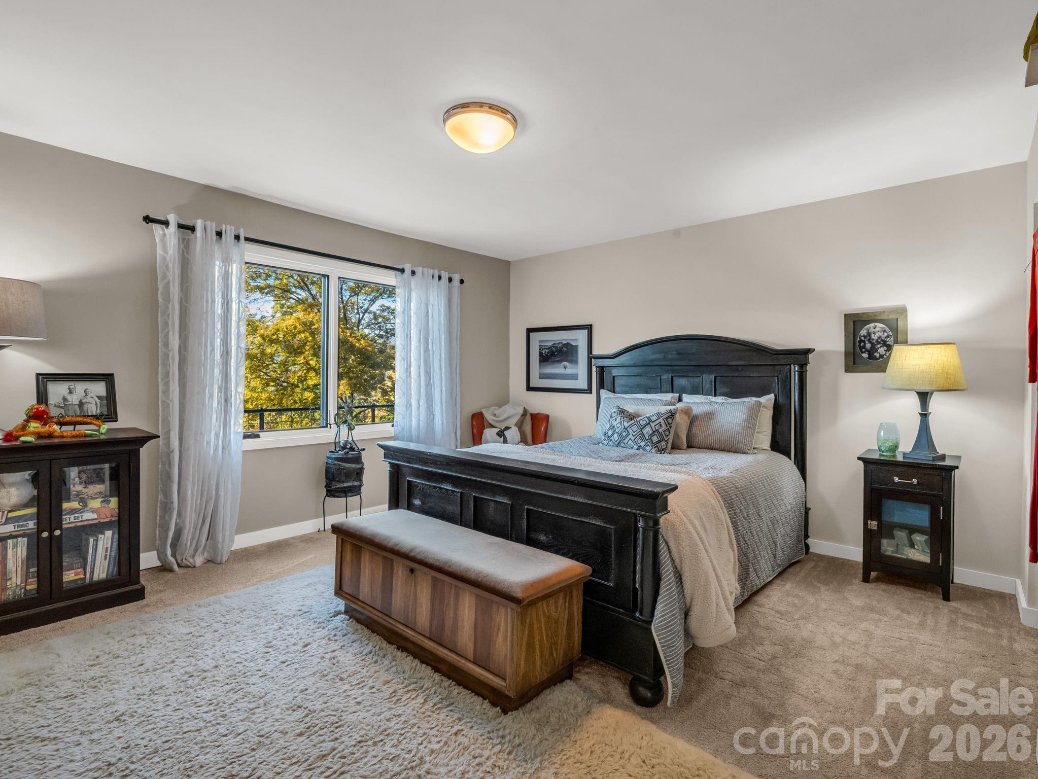 200 Piney Mountain Road Tryon, NC 28782 - Photo 31 of 48 a bedroom with a bed and window