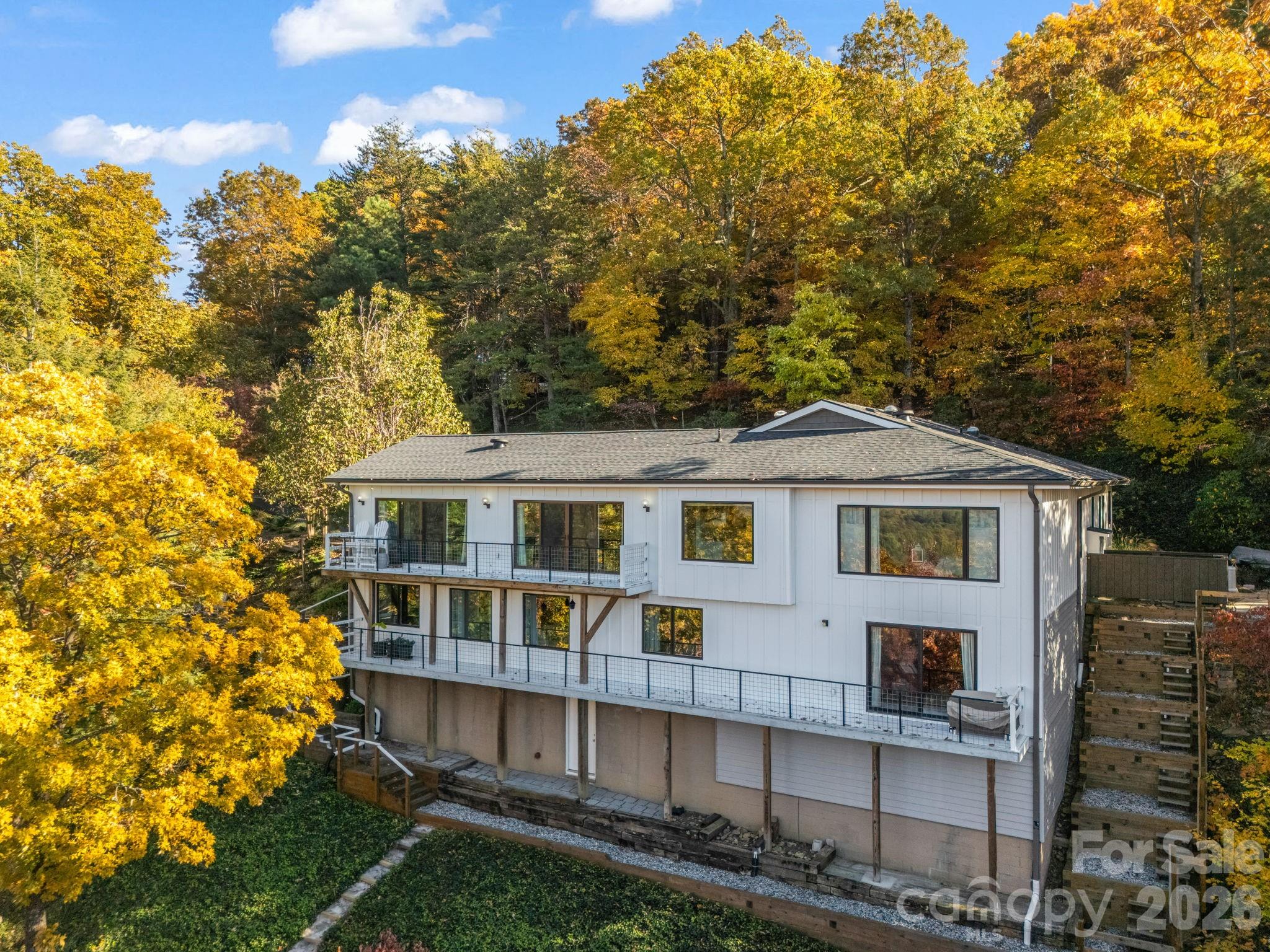 200 Piney Mountain Road Tryon, NC 28782 - Photo 37 of 48 a front view of a house with a garden