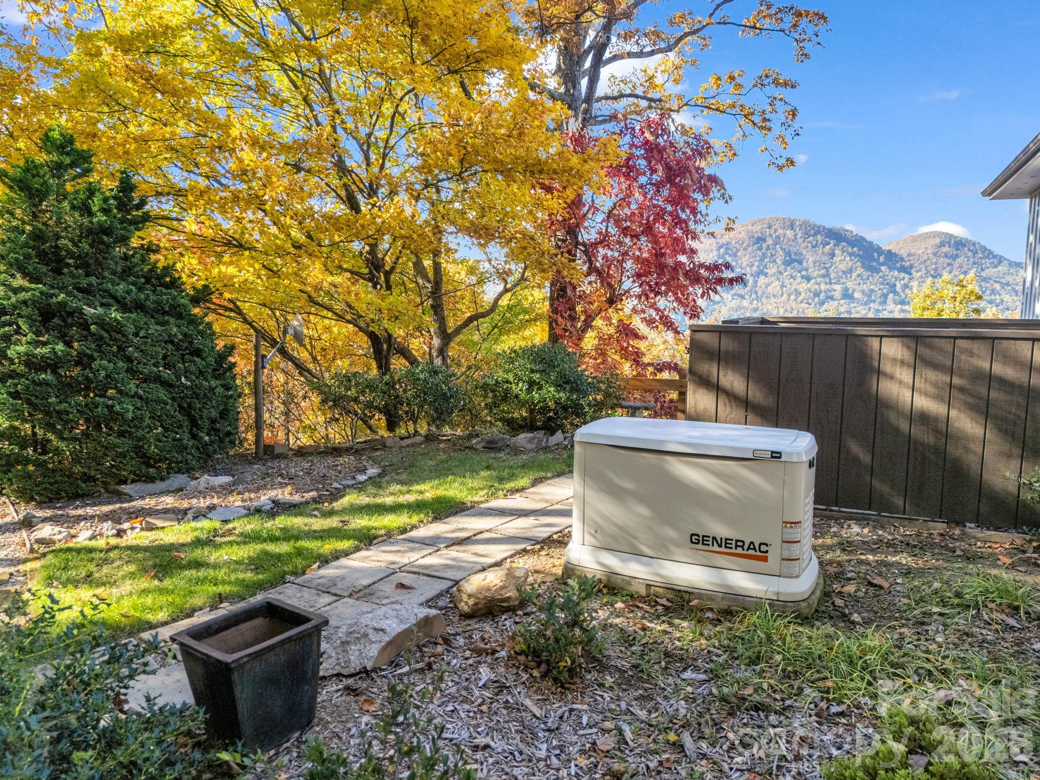 200 Piney Mountain Road Tryon, NC 28782 - Photo 41 of 48 a view of a yard with large trees