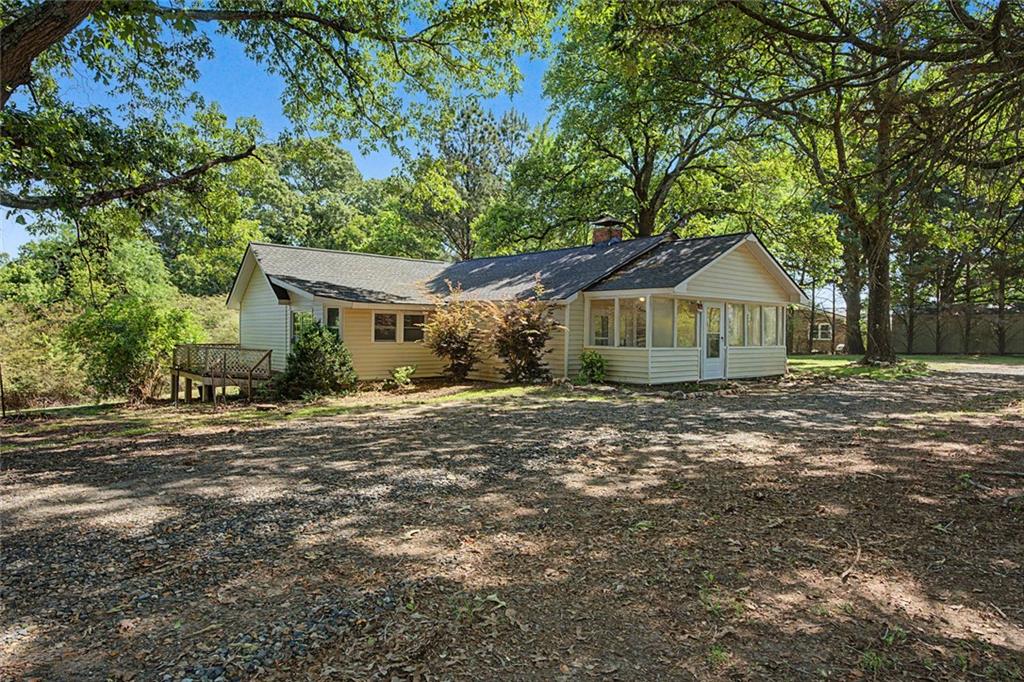1055 Millertown Road Temple, GA 30179 - Photo 3 of 48 a view of a house with a yard