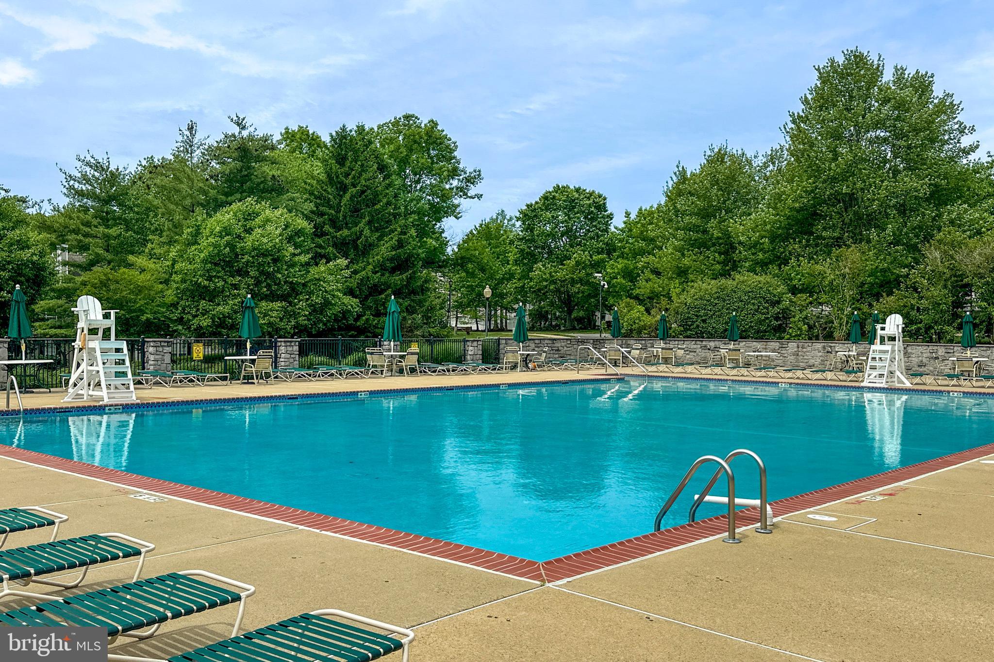24 Foster Road Pennington, NJ 08534 - Photo 32 of 38 a view of a swimming pool with a yard