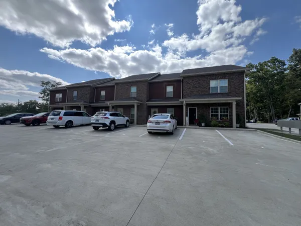 a view of swimming pool with outdoor seating and mountain view