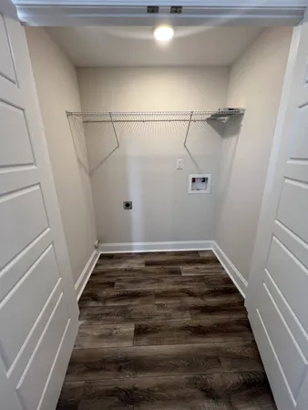 a view of a room with racks on the wall