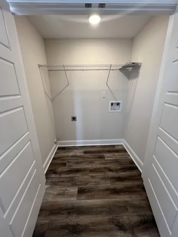 a view of a room with racks on the wall