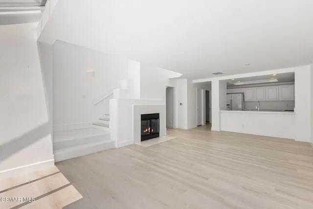 a view of a livingroom with a fireplace