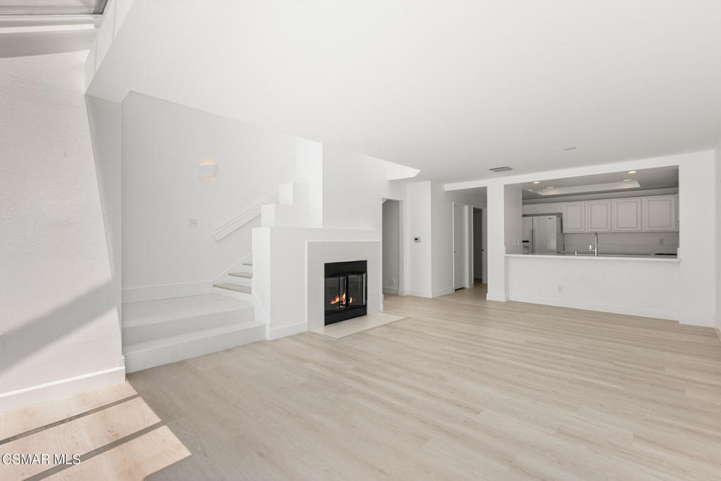 4240 Lost Hills Road, Unit 802 Calabasas, CA 91301 - Photo 14 of 49 a view of a livingroom with a fireplace
