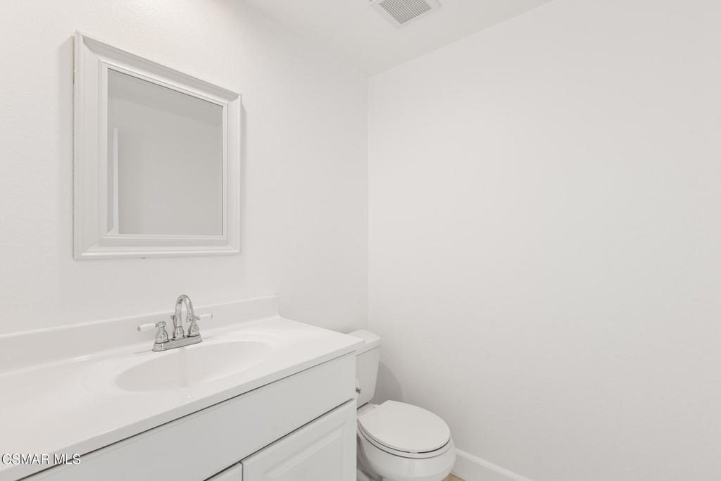 4240 Lost Hills Road, Unit 802 Calabasas, CA 91301 - Photo 29 of 49 a white toilet sitting next to a white sink