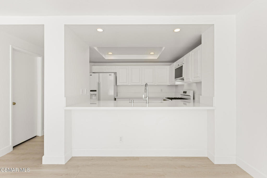 4240 Lost Hills Road, Unit 802 Calabasas, CA 91301 - Photo 30 of 49 a view of kitchen with cabinets