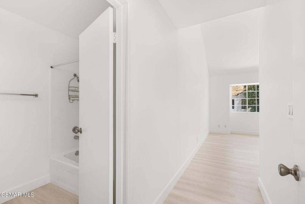 4240 Lost Hills Road, Unit 802 Calabasas, CA 91301 - Photo 36 of 49 a view of a hallway with white walls