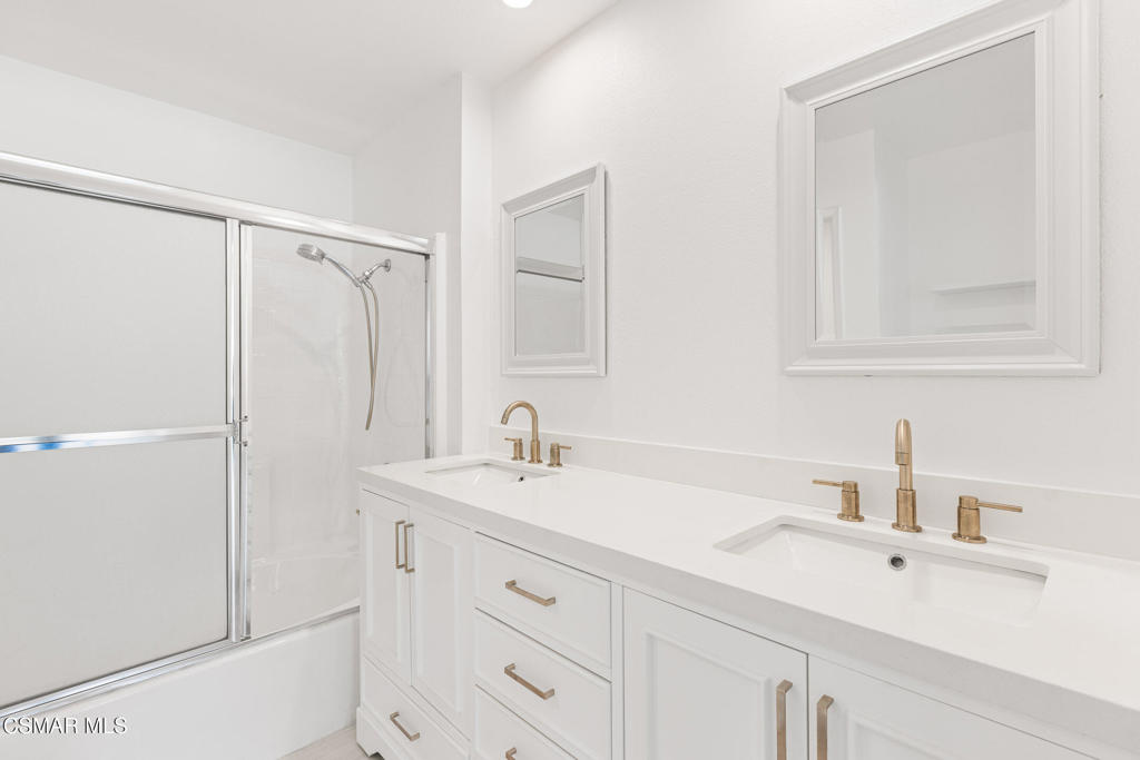 4240 Lost Hills Road, Unit 802 Calabasas, CA 91301 - Photo 42 of 49 a bathroom with a sink and a mirror