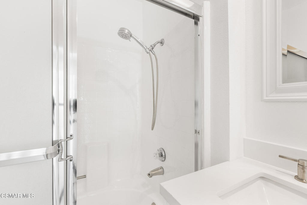 4240 Lost Hills Road, Unit 802 Calabasas, CA 91301 - Photo 43 of 49 a bathroom with a sink and shower