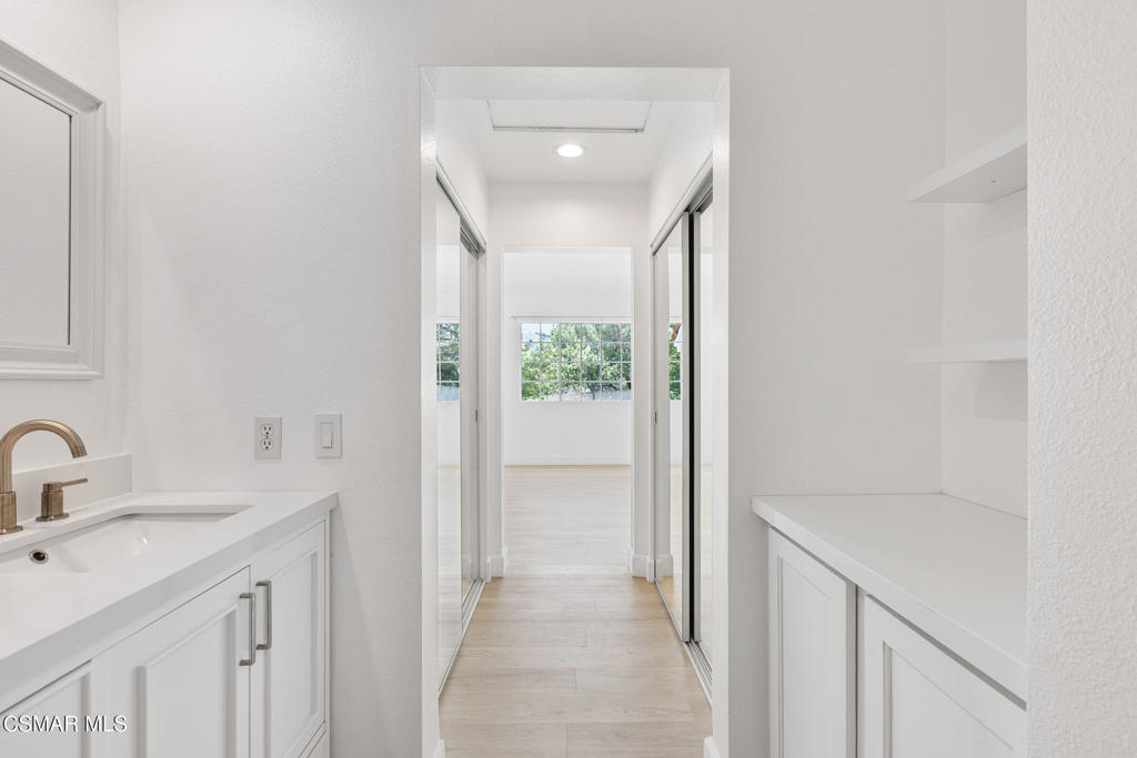 4240 Lost Hills Road, Unit 802 Calabasas, CA 91301 - Photo 44 of 49 a bathroom with a sink and a mirror