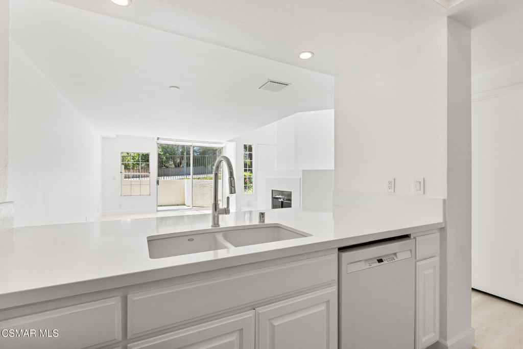 4240 Lost Hills Road, Unit 802 Calabasas, CA 91301 - Photo 9 of 49 a kitchen with a sink and a window