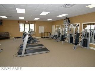 8490 Kingbird Loop, Unit 934 Estero, FL 33967 - Photo 12 of 26 a view of a room with gym equipment