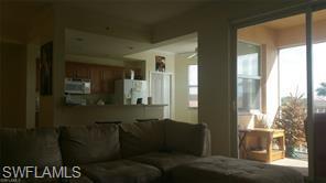 8490 Kingbird Loop, Unit 934 Estero, FL 33967 - Photo 26 of 26 a living room with furniture and a window