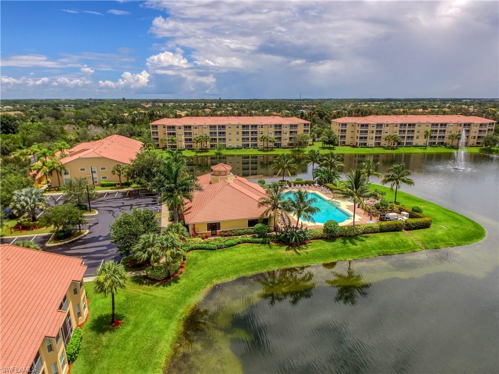 8490 Kingbird Loop, Unit 934 Estero, FL 33967 - Photo 3 of 26 a view of a lake with a city
