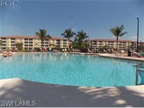 8490 Kingbird Loop, Unit 934 Estero, FL 33967 - Photo 5 of 26 a view of swimming pool and lake view