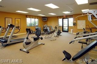 8490 Kingbird Loop, Unit 934 Estero, FL 33967 - Photo 10 of 26 a view of a room with gym equipment