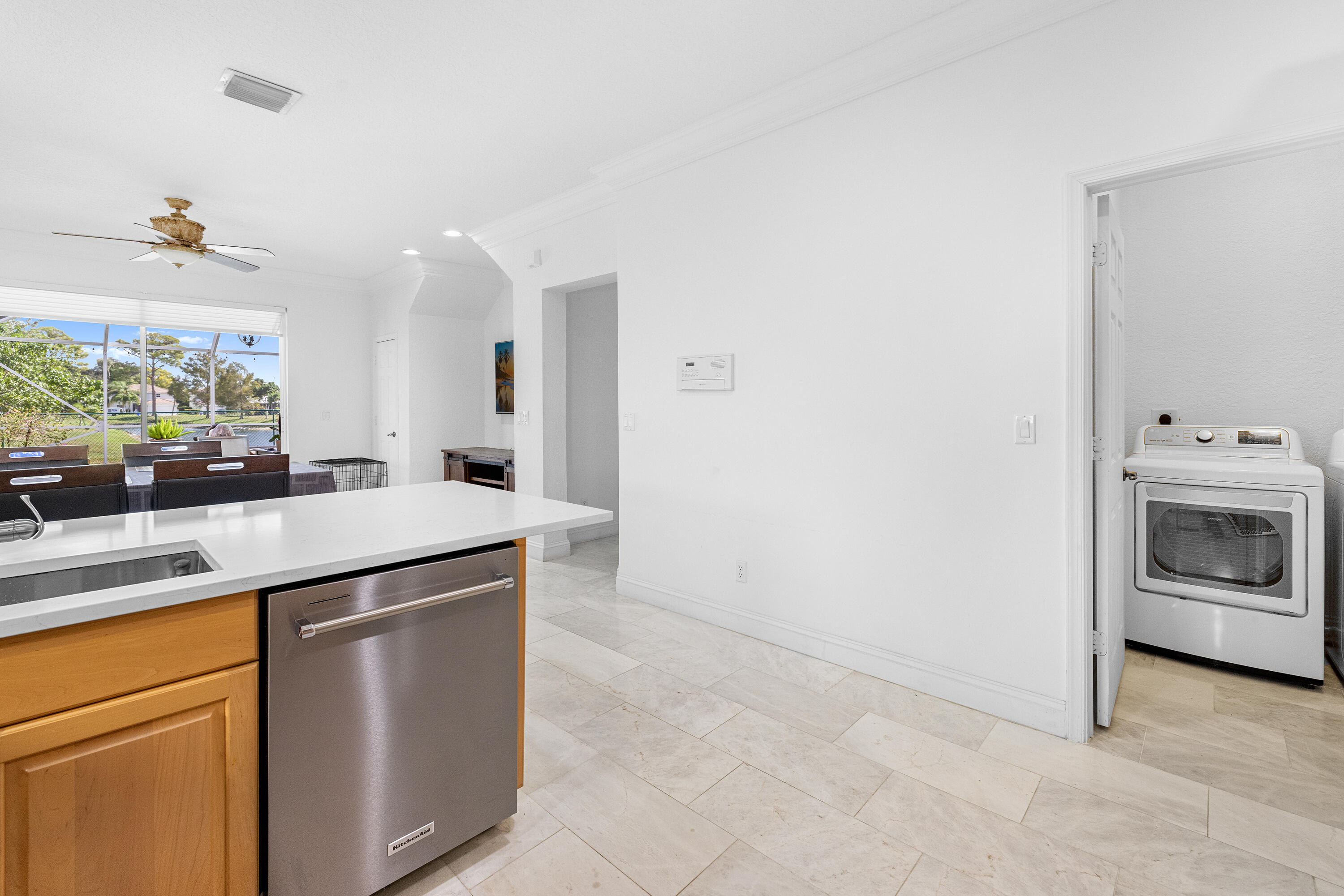 6575 Spring Meadow Drive Greenacres, FL 33413 - Photo 16 of 54 a kitchen with a sink and a stove top oven