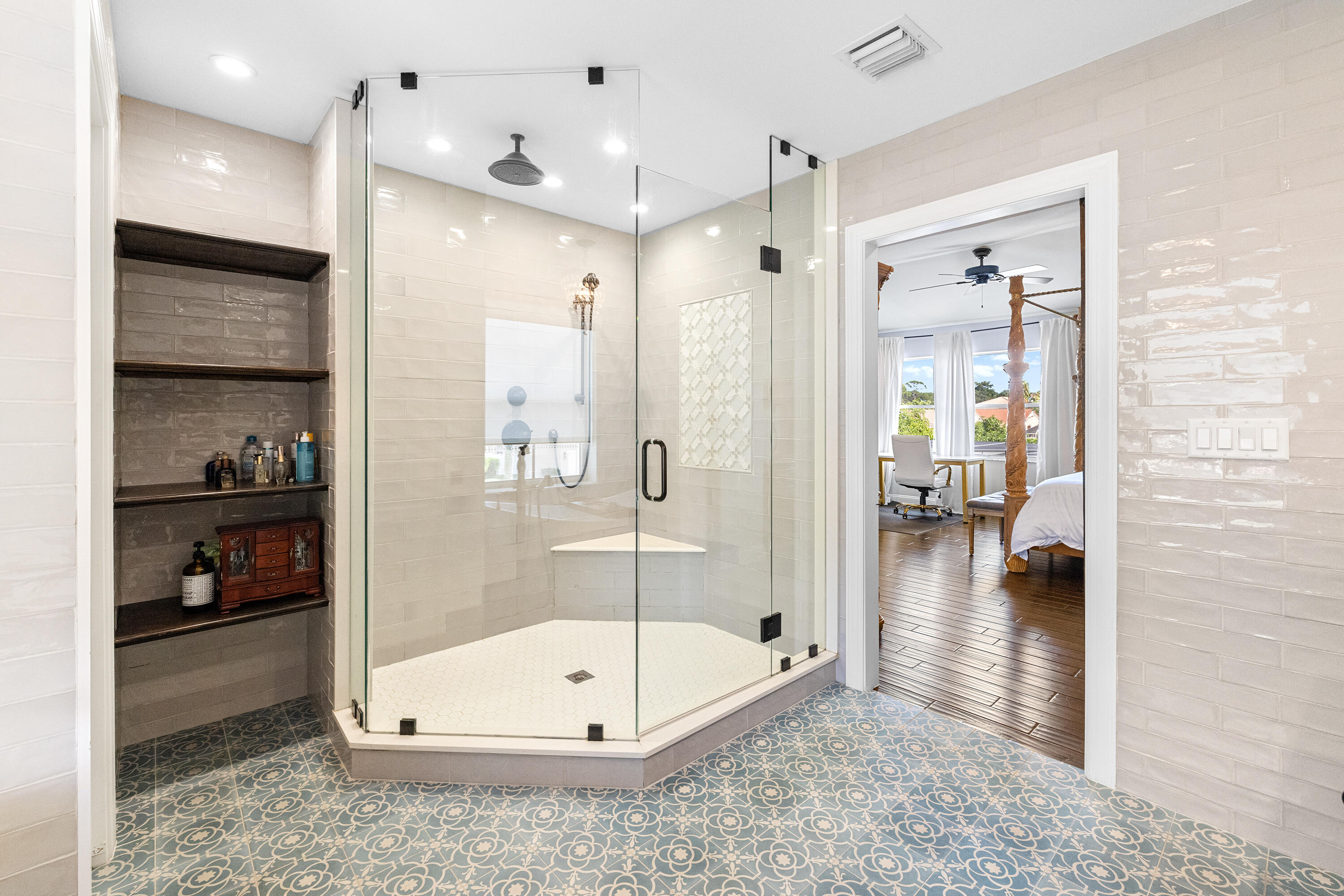 6575 Spring Meadow Drive Greenacres, FL 33413 - Photo 25 of 54 a bathroom with a tub and a shower