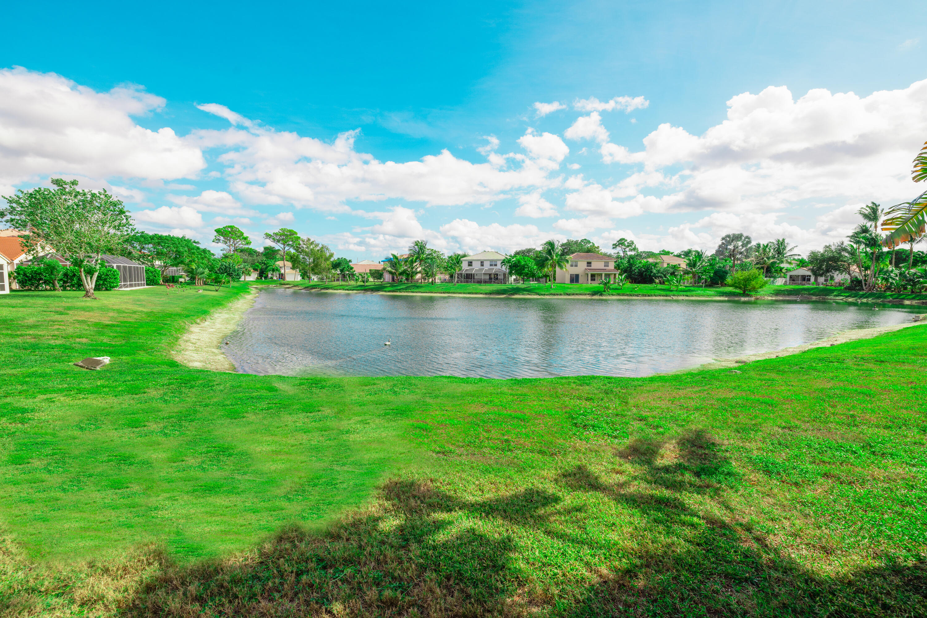 6575 Spring Meadow Drive Greenacres, FL 33413 - Photo 35 of 54 a view of a lake