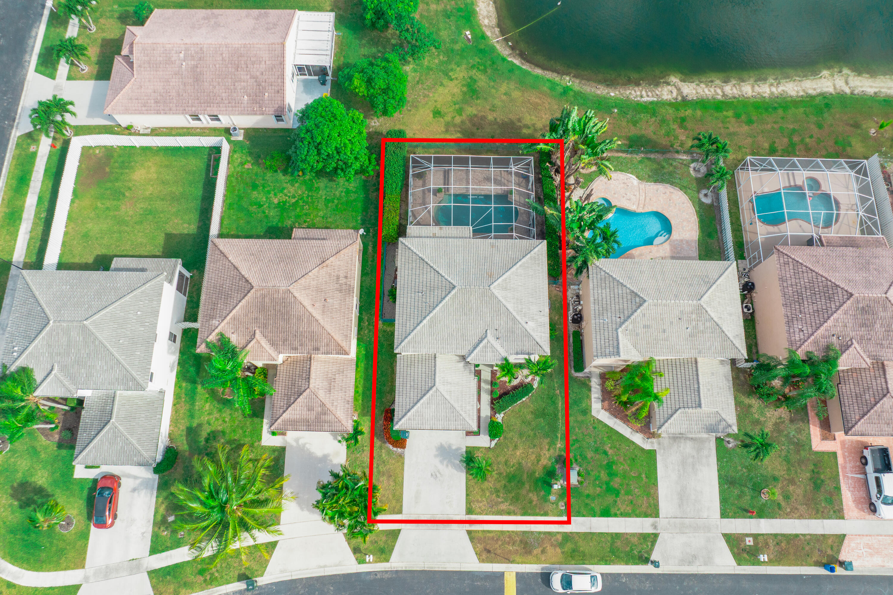 6575 Spring Meadow Drive Greenacres, FL 33413 - Photo 44 of 54 an aerial view of house with yard