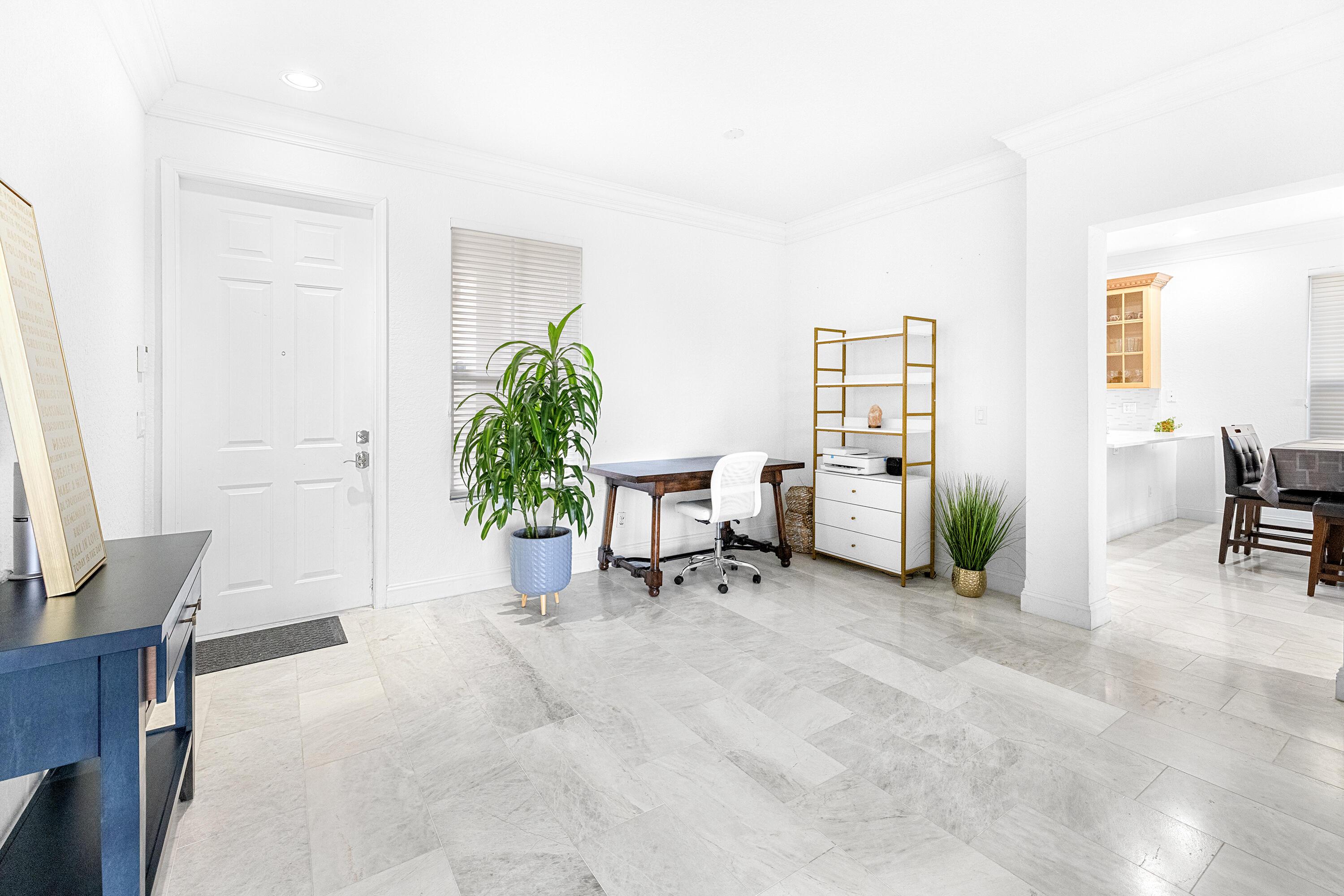 6575 Spring Meadow Drive Greenacres, FL 33413 - Photo 7 of 54 a view of livingroom with furniture and a potted plant