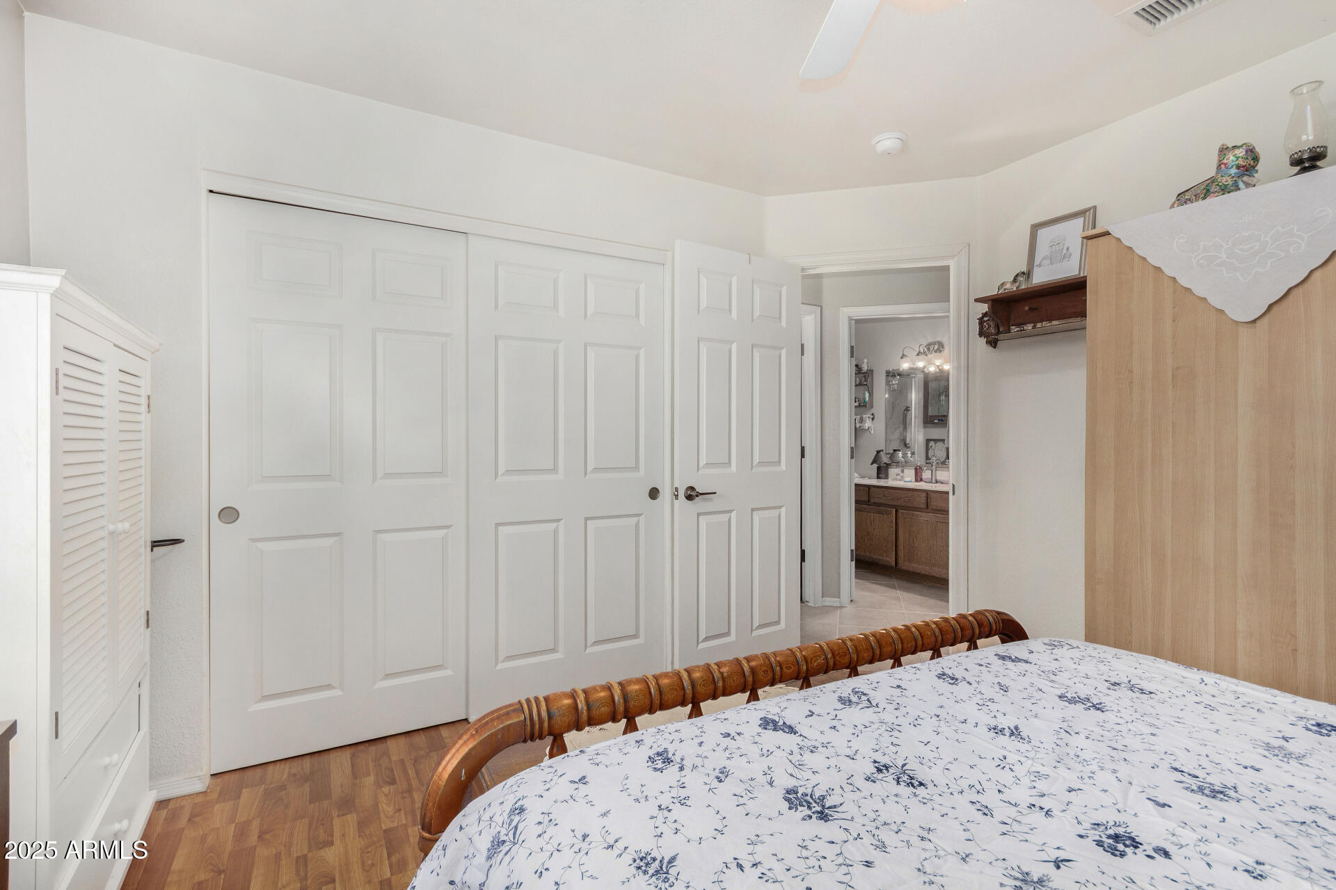 538 West Silver Creek Road Gilbert, AZ 85233 - Photo 24 of 41 a bedroom with a bed and closet