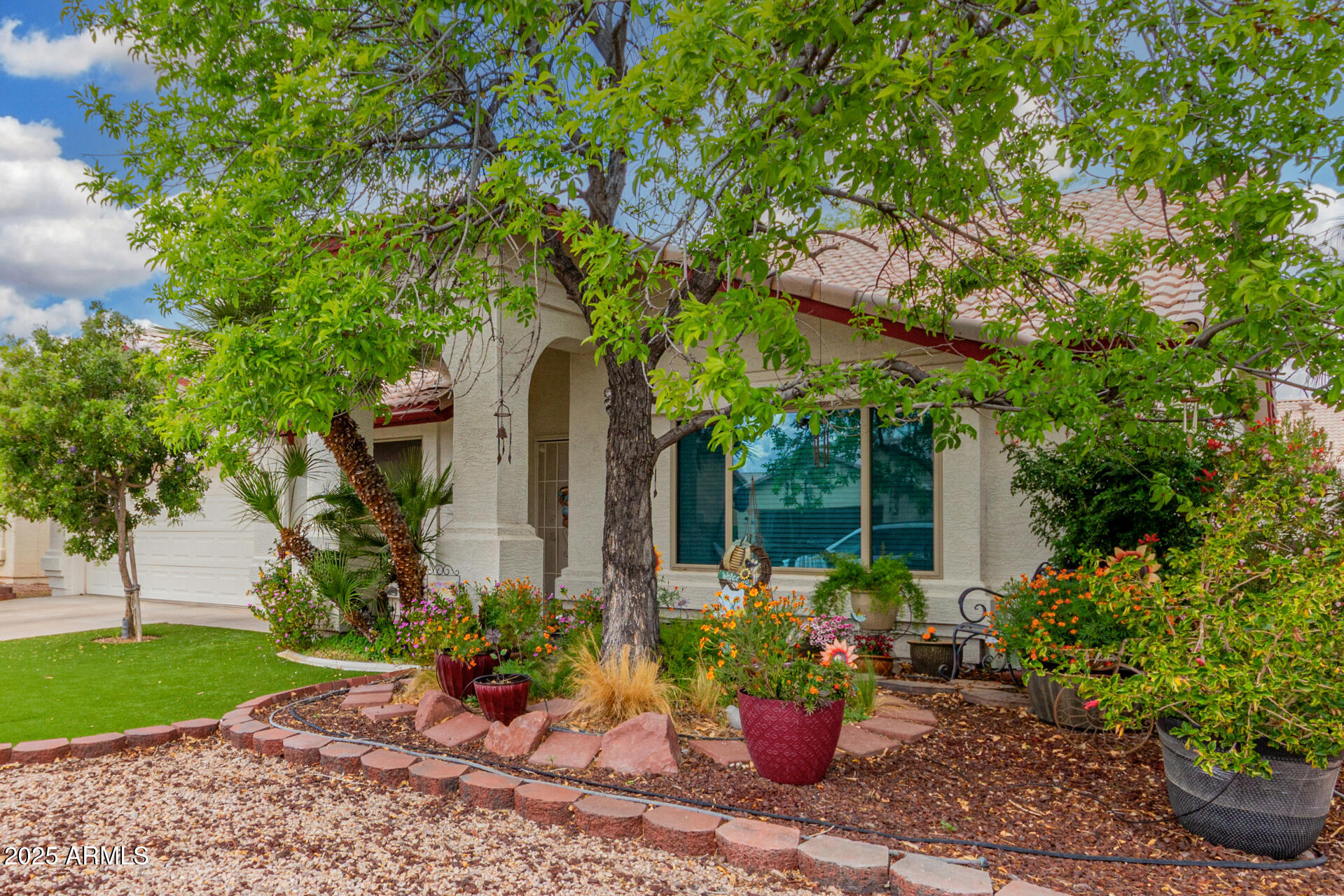 538 West Silver Creek Road Gilbert, AZ 85233 - Photo 3 of 41 a view of a house with backyard and sitting area