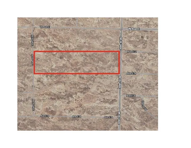 a black and white photo of a bathroom