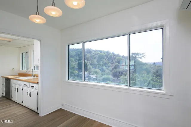 a view of bathroom with dual sinks