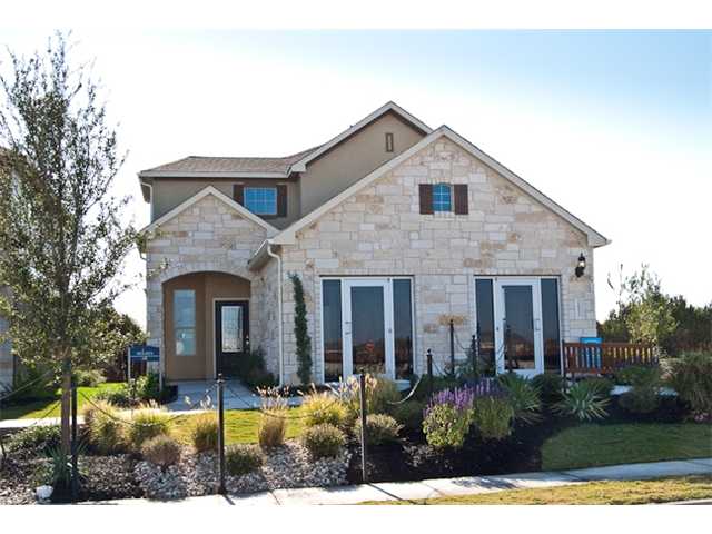 10012 Wading Pool Path Austin, TX 78748 - Photo 1 of 1 a front view of a house with garden