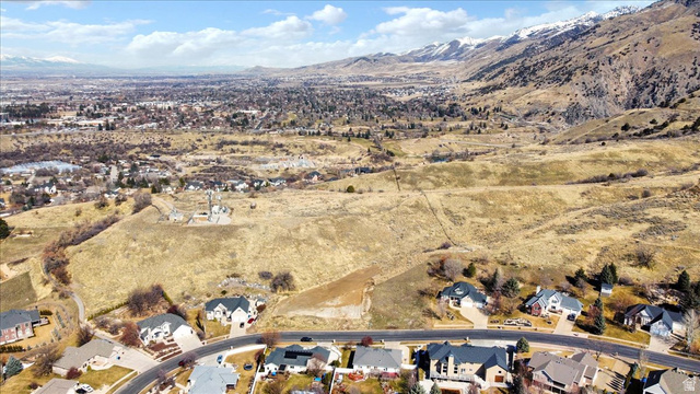 147 Winding Way, Unit 50 Logan, UT 84321 - Photo 10 of 16 View of property location featuring nearby suburban area and a mountain backdrop