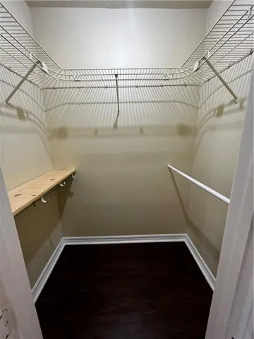 a view of a room with racks on the wall