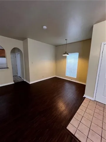 a view of a livingroom with wooden floor