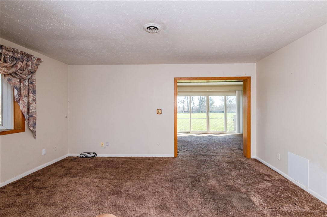 5760 Kitridge Road Dayton, OH 45424 - Photo 3 of 19 Bright interior space offering scenic outdoor views, perfect for peaceful living.
