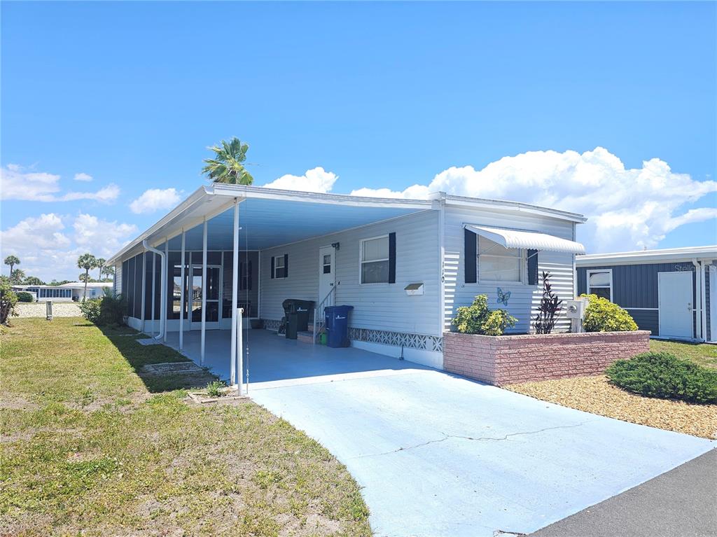 110 Roma Road Venice, FL 34285 - Photo 1 of 45 a front view of a house with a patio