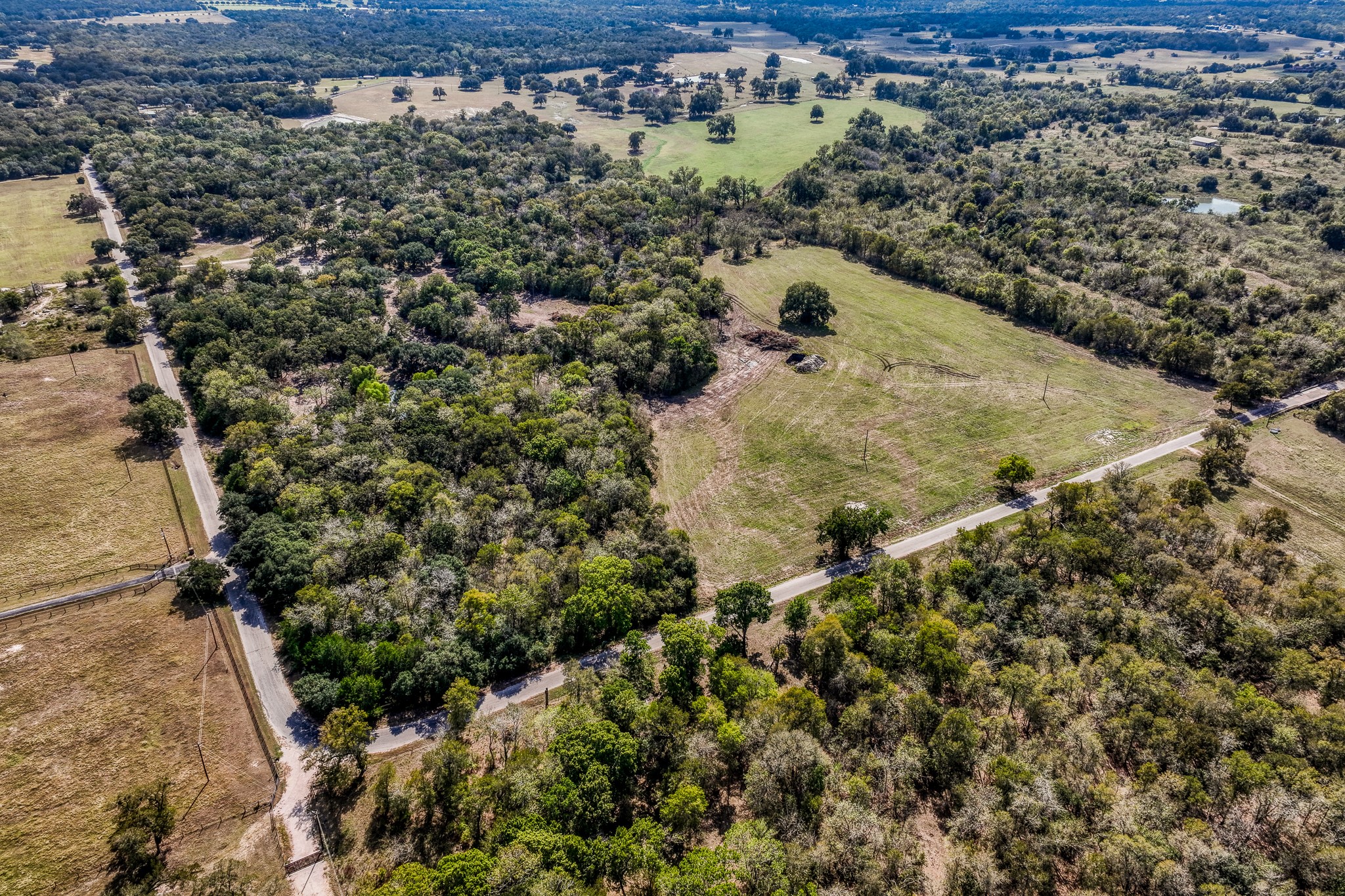 5 Sun Oil Road Brenham, TX 77833 - Photo 26 of 28 an aerial view of residential house with space and trees all around