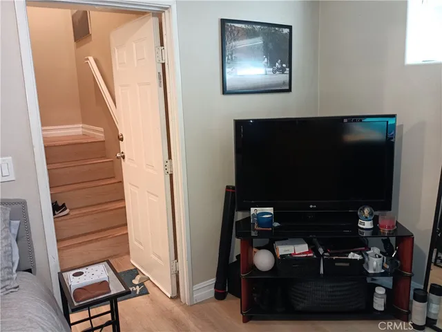 a kitchen with a refrigerator and cabinets