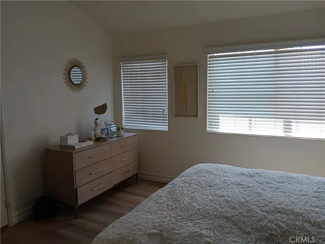 a kitchen with sink refrigerator and window