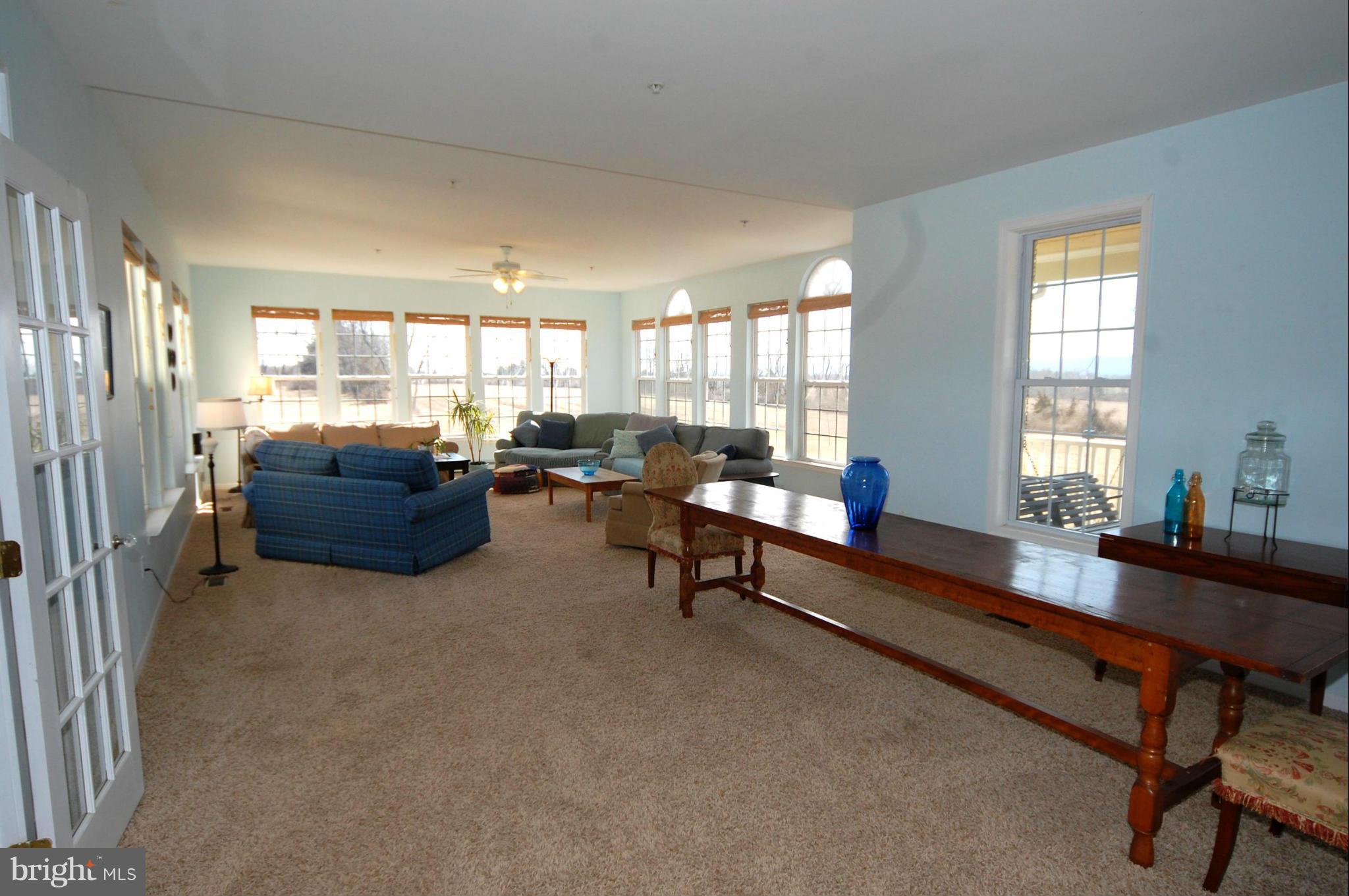 9726 Appolds Road Rocky Ridge, MD 21778 - Photo 14 of 30 a living room with furniture and a large window