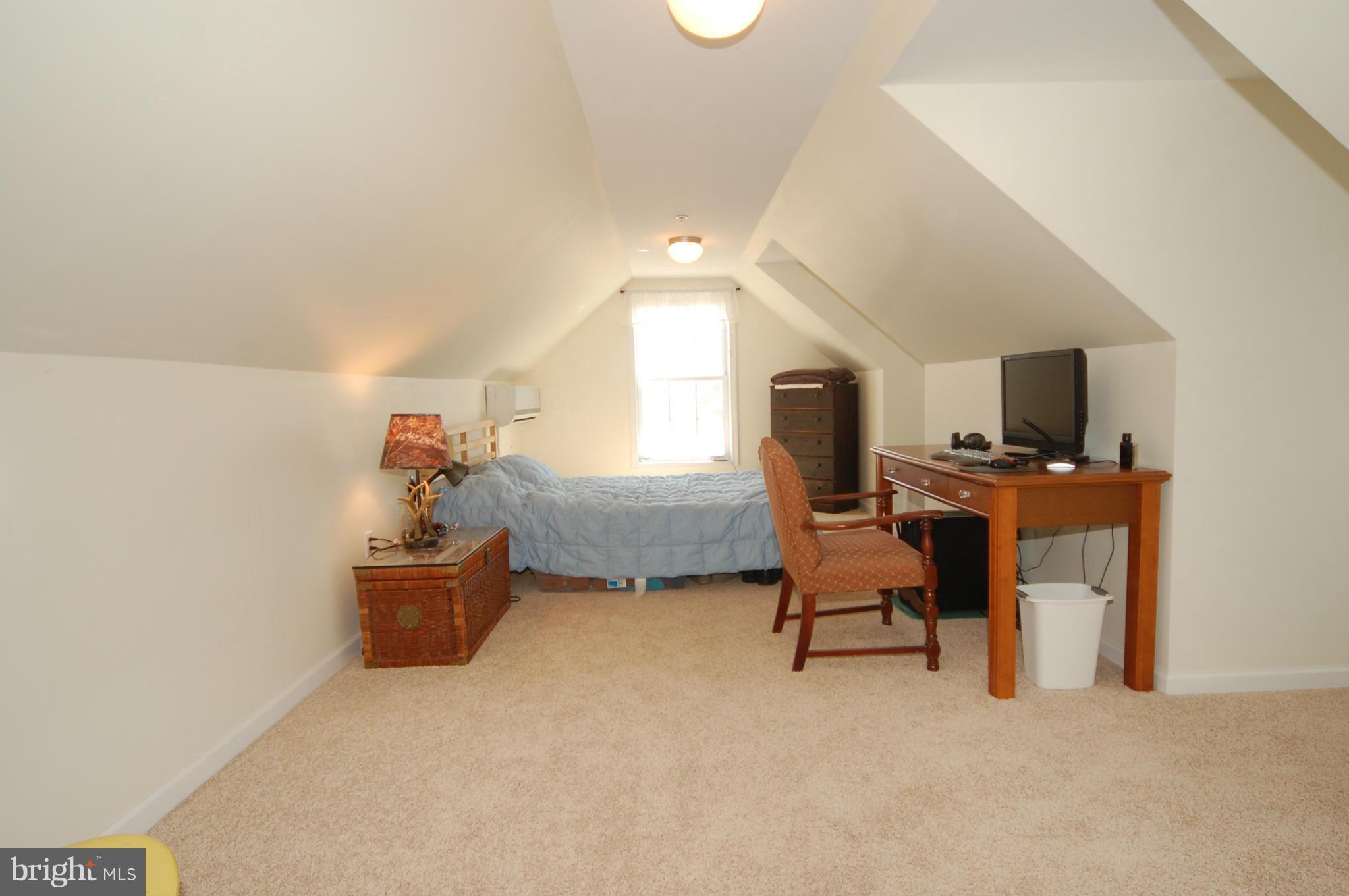 9726 Appolds Road Rocky Ridge, MD 21778 - Photo 22 of 30 a living room with furniture and a flat screen tv