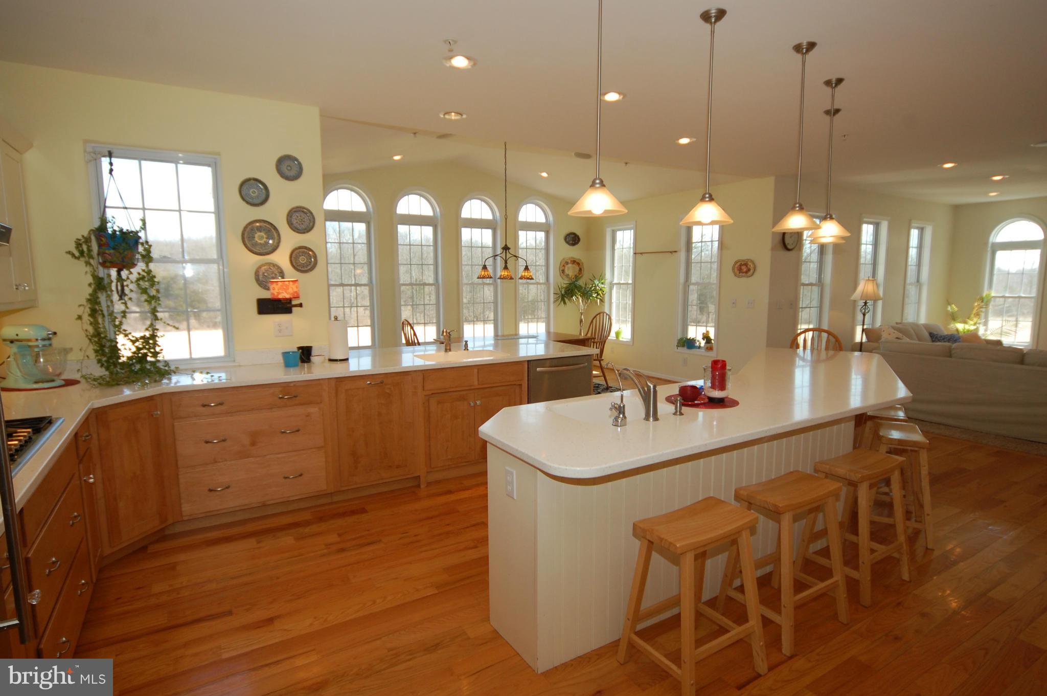 9726 Appolds Road Rocky Ridge, MD 21778 - Photo 8 of 30 a large white kitchen with a large island